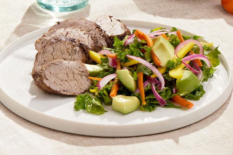 Jerk Grilled Tenderloin with Mango Avocado Kale Salad