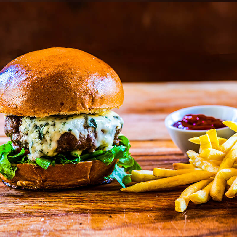 Black and Blue Burger with Grilled Onions