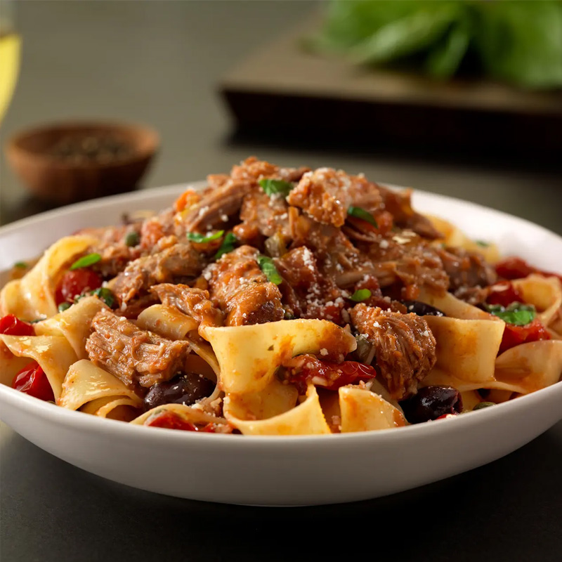 Pork Pappardelle Puttanesca with Basil and Pecorino Cheese